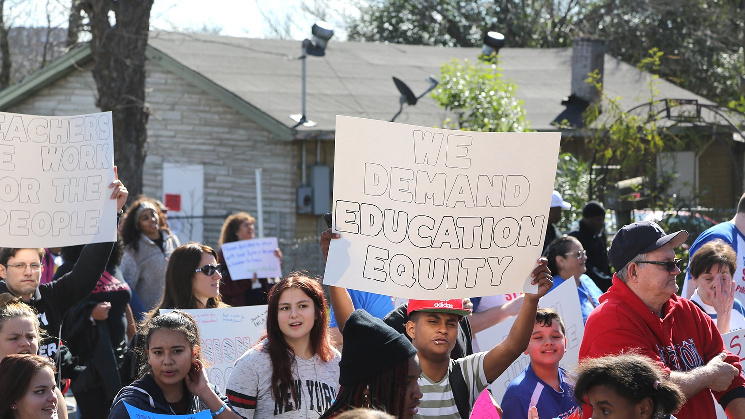 Thousands of people participate in the MLK March Monday on San Antonio's East Side. Photo by Ben Olivo | Heron