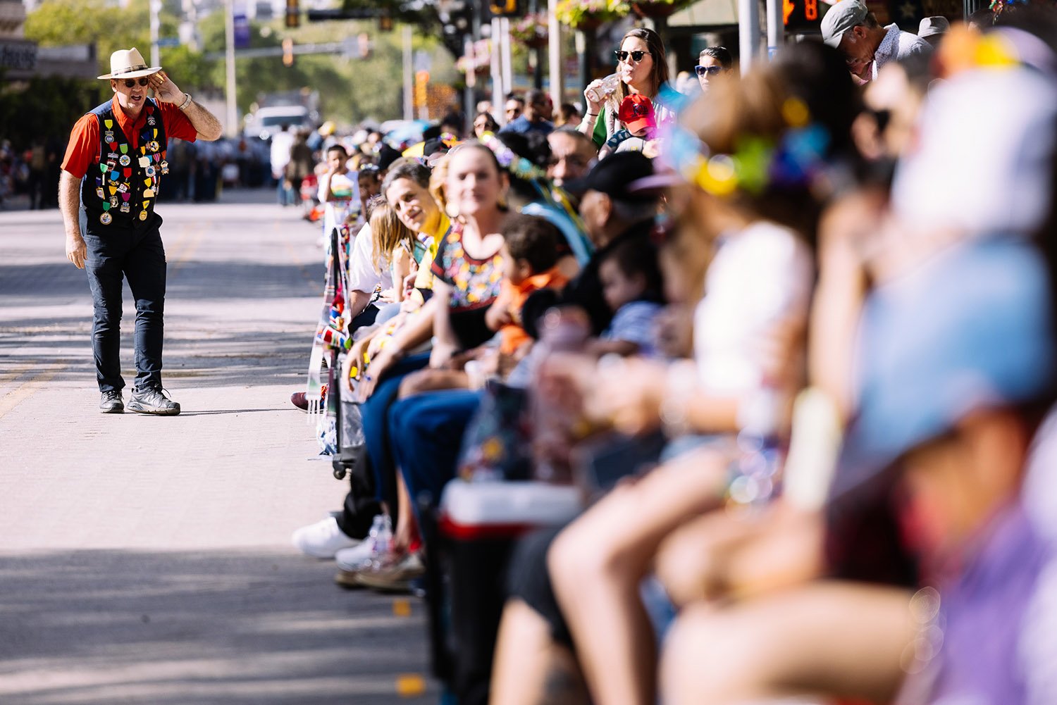 Thousands of people attend the Battle of Flowers Parade on Friday, April 8, 2022, in San Antonio, Texas. Photo by Chris Stokes | Heron contributor