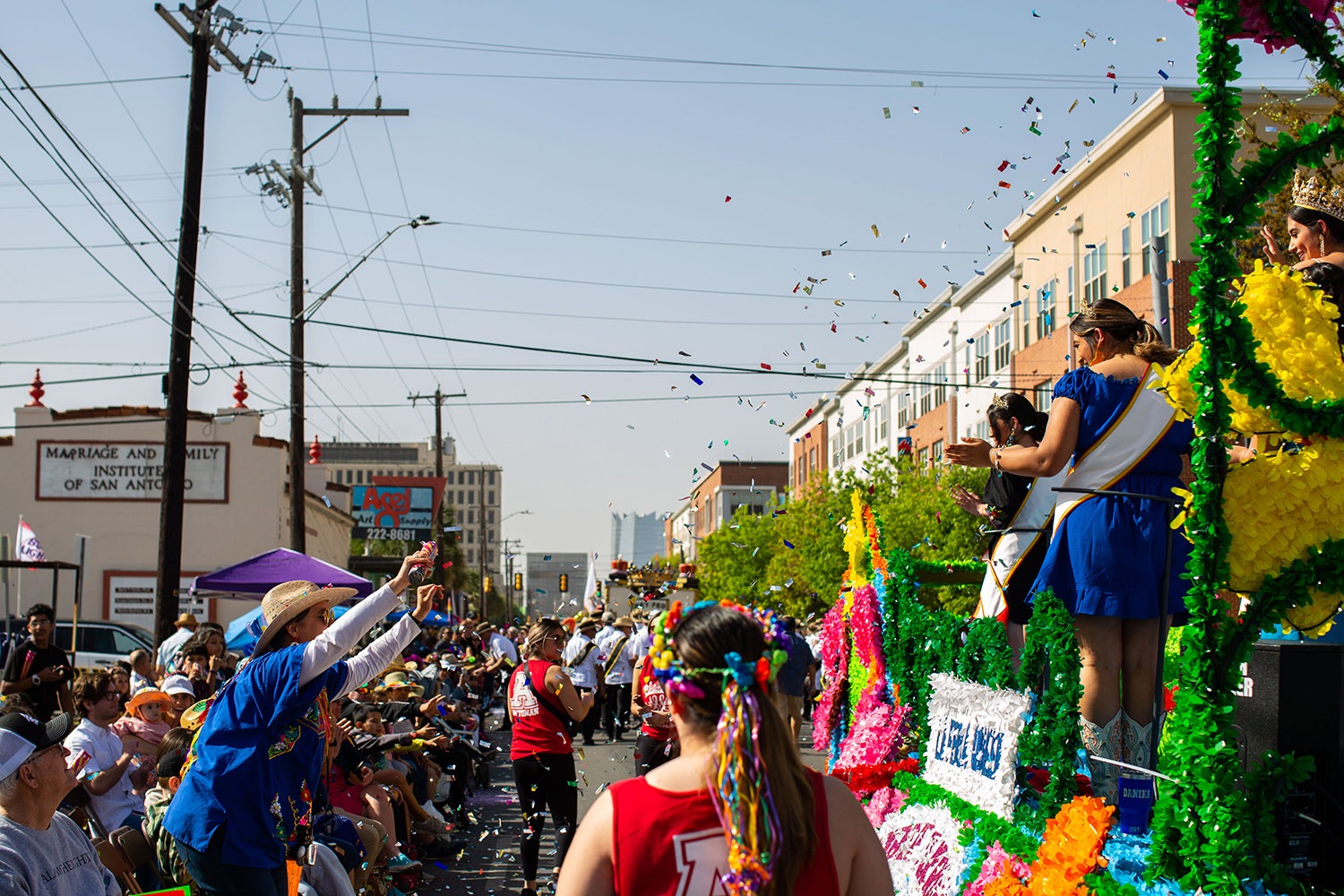 Thousands of people attend the Battle of Flowers Parade on Friday, April 8, 2022, in San Antonio, Texas. Photo by Kaylee Greenlee Beal | Heron contributor