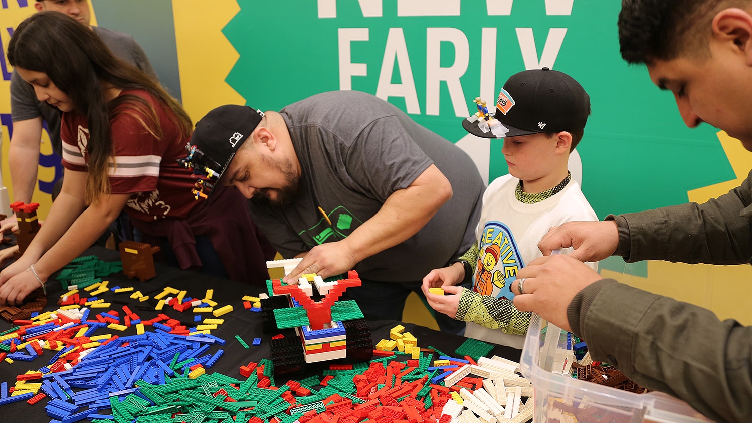 Brick Factor 2019 contestant Mario Salazar (left) and Tristan Ingram, 9, compete in the nationwide competition Sunday at Rivercenter Mall.