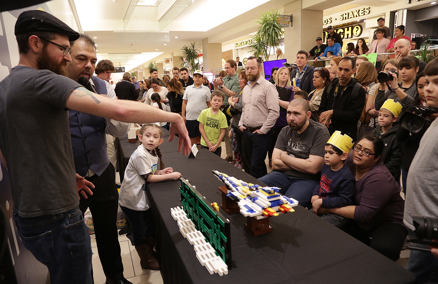 Stanton Bain of Waco explains his Lego creation to fans and the media during Brick Factor 2019 Sunday at Rivercenter Mall.