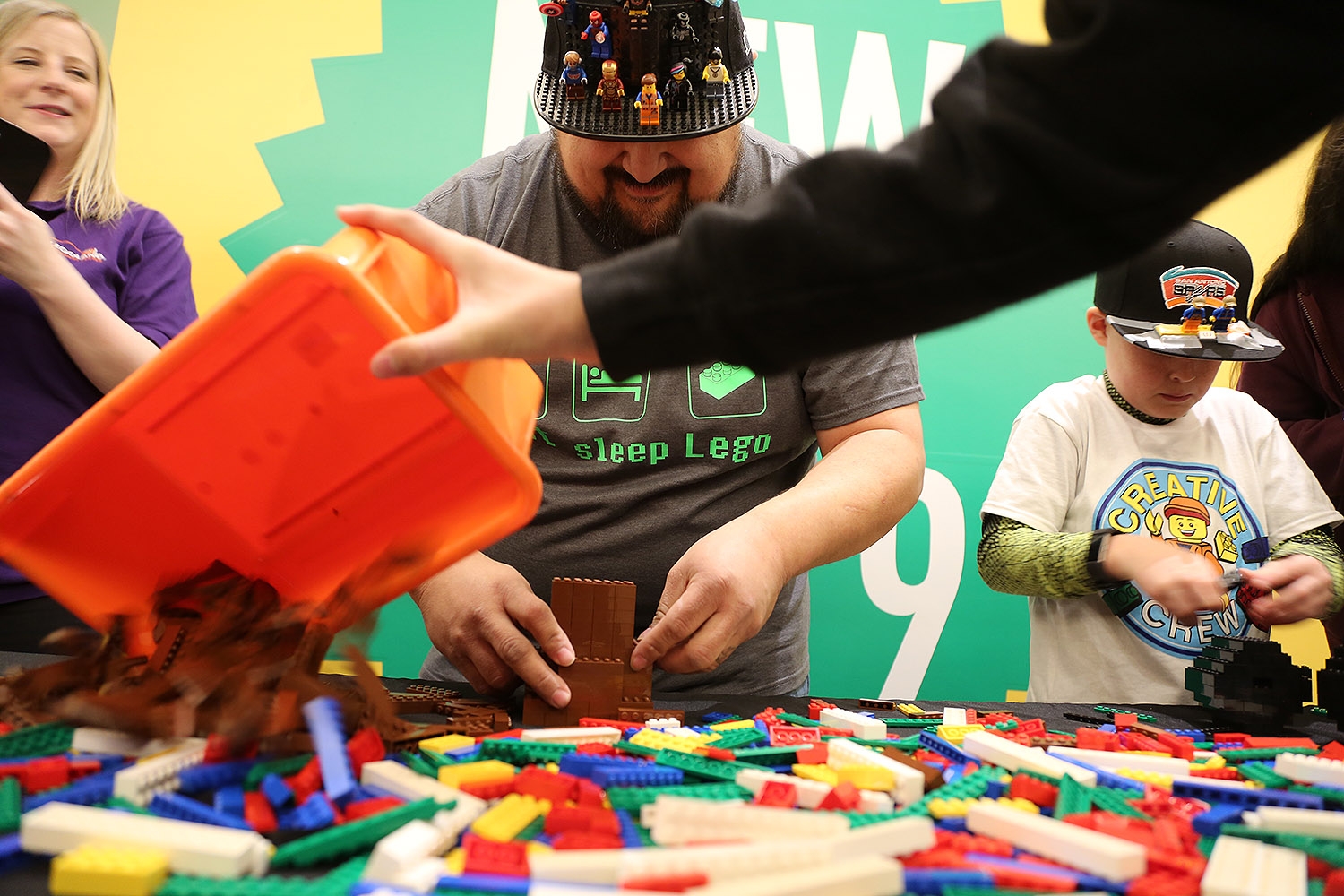 Brick Factor 2019 contestant Mario Salazar (left) and Tristan Ingram, 9, compete in the nationwide competition Sunday at Rivercenter Mall.