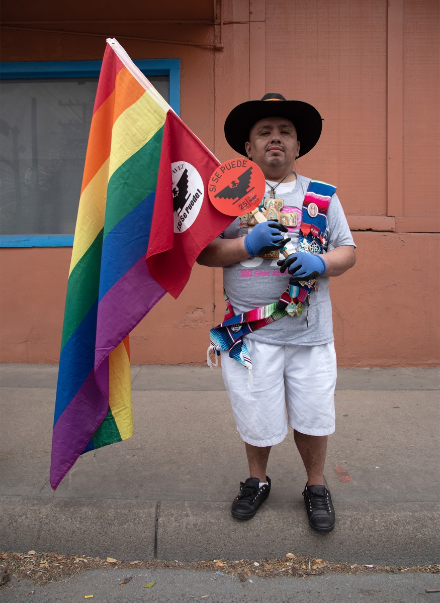 Paco Garcia waits for San Antonio’s 23rd annual César E. Chávez March for Justice to begin on Saturday, March 30, on Guadalupe Street. Photo by V. Finster | Heron