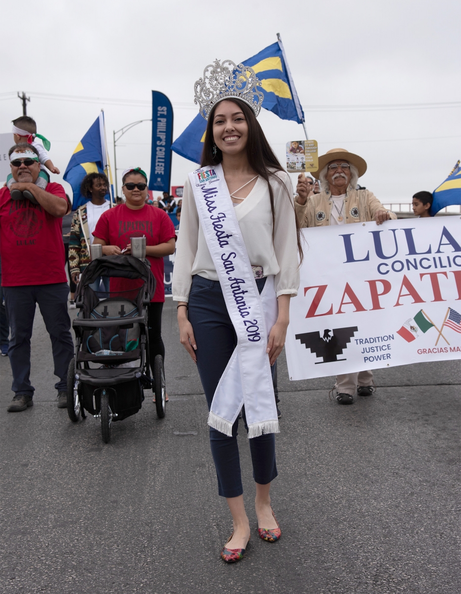 Victoria Gonzalez, Miss Fiesta San Antonio 2019, poses for a photo during San Antonio’s 23rd annual César E. Chávez March for Justice Saturday, March 30, on Guadalupe Street. Photo by V. Finster | Heron