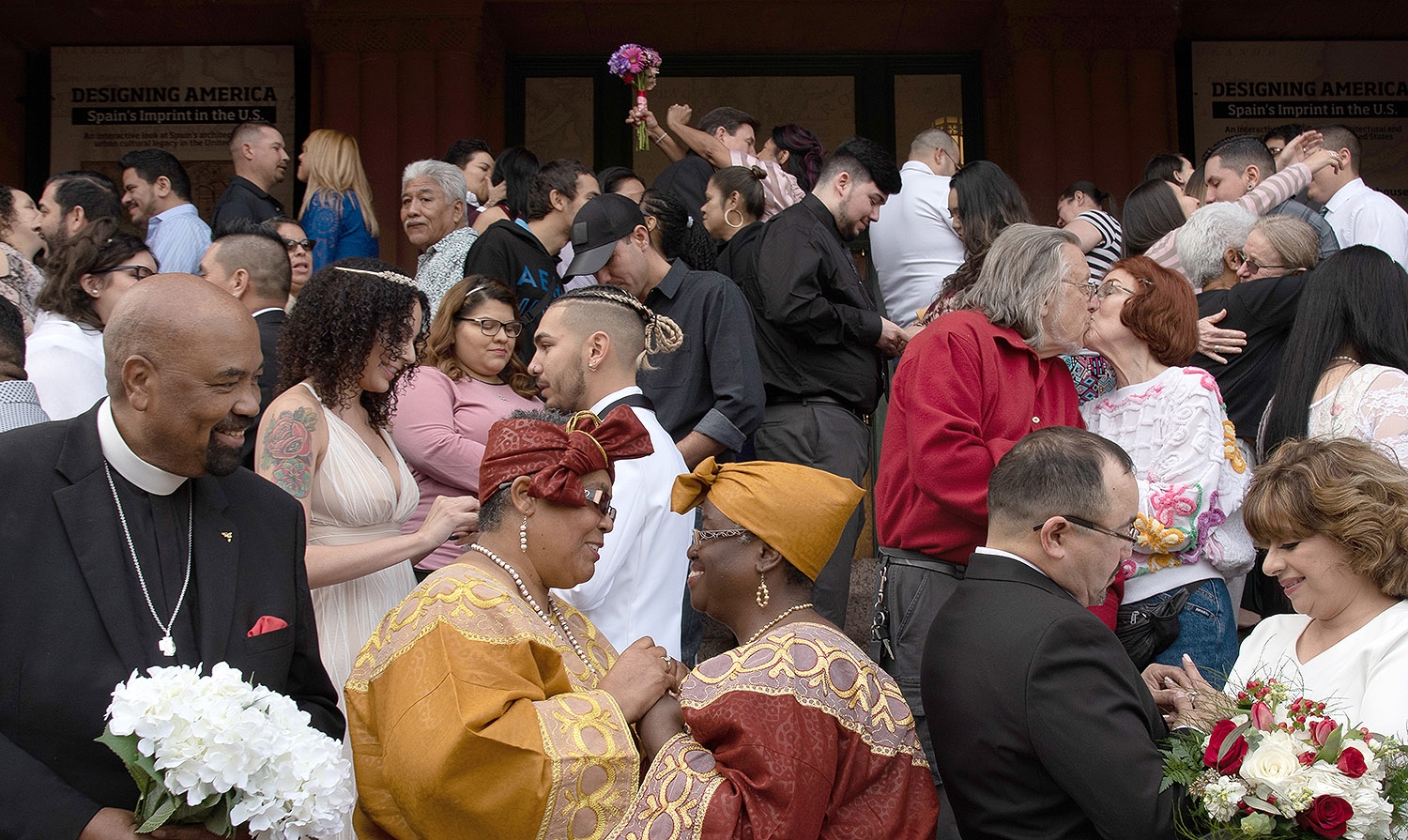 Thirty two couples are pronounced spouses after being wed on the Bexar County Courthouse steps at 10 a.m. Feb. 14. <em><b>Photo by V. Finster | Heron</b></em>