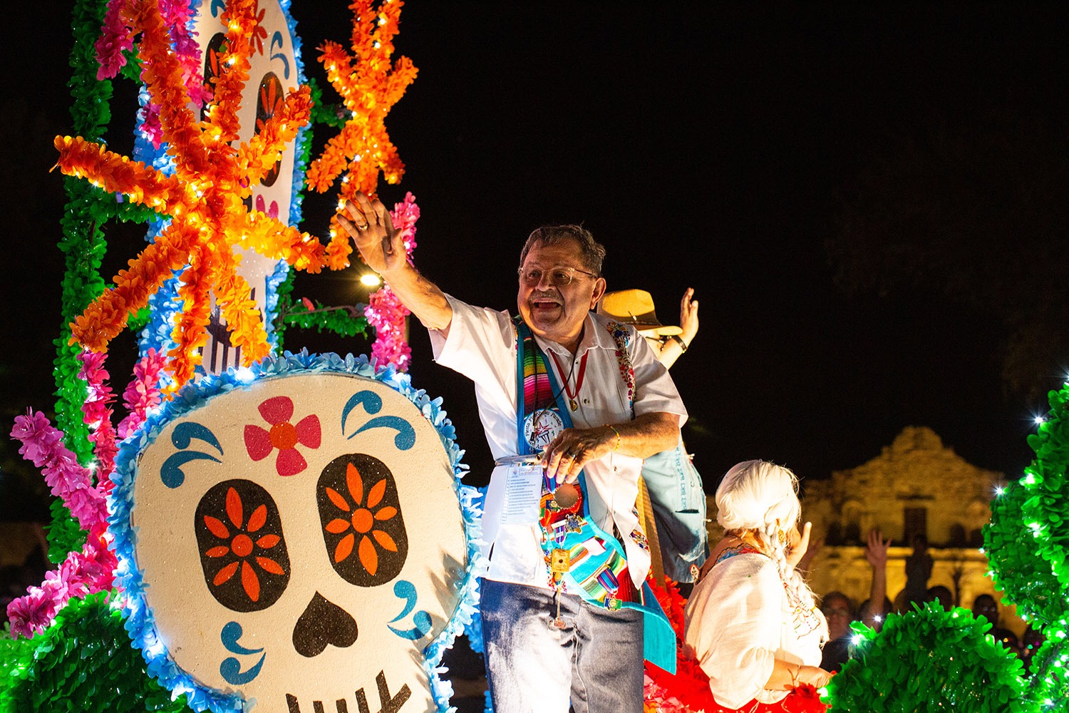 Thousands of people attend the Fiesta Flambeau Parade on Saturday, April 9, 2022, in San Antonio, Texas. Photo by Kaylee Greenlee Beal | Heron contributor