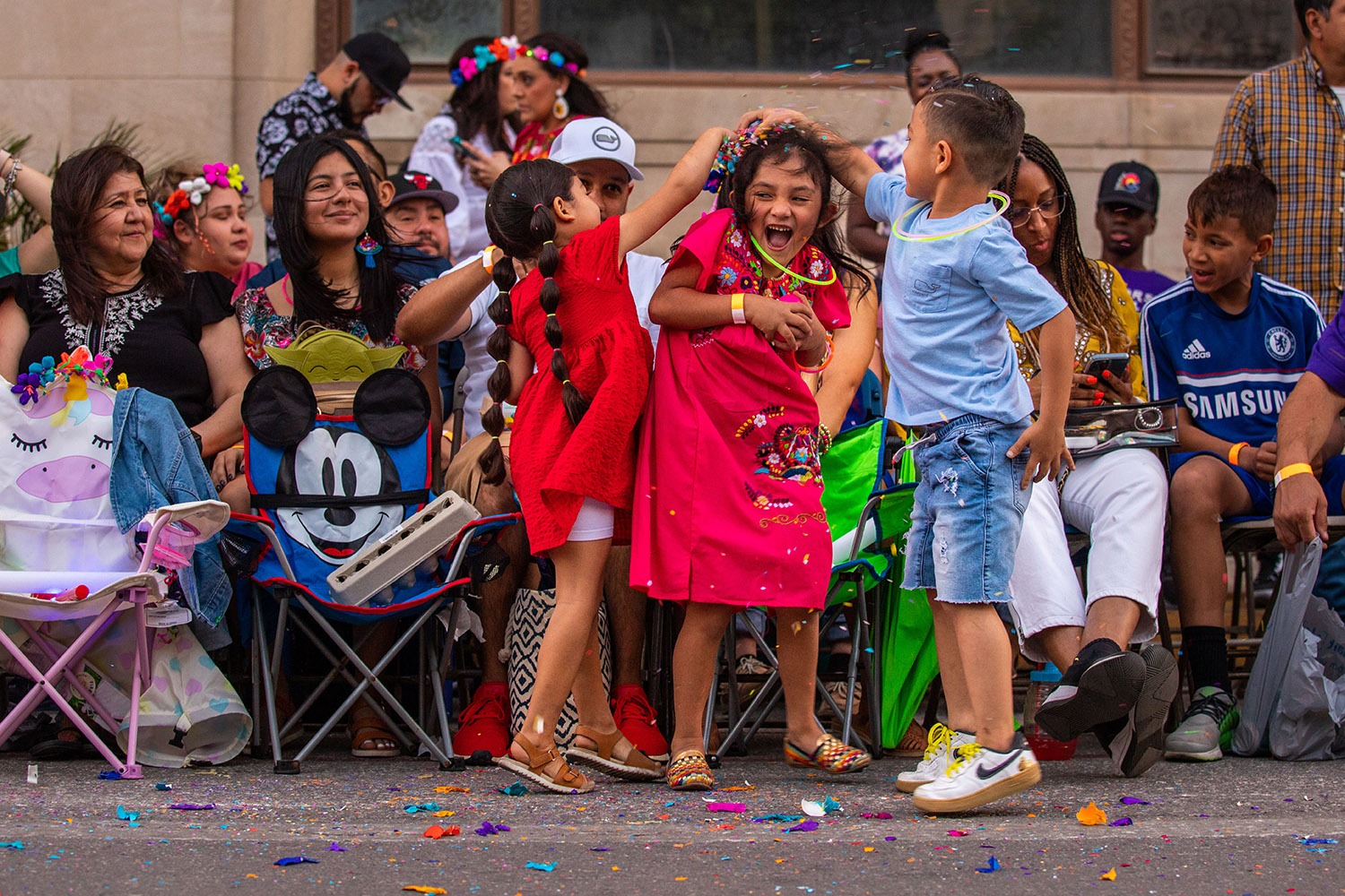 Thousands of people attend the Fiesta Flambeau Parade on Saturday, April 9, 2022, in San Antonio, Texas. Photo by Kaylee Greenlee Beal | Heron contributor