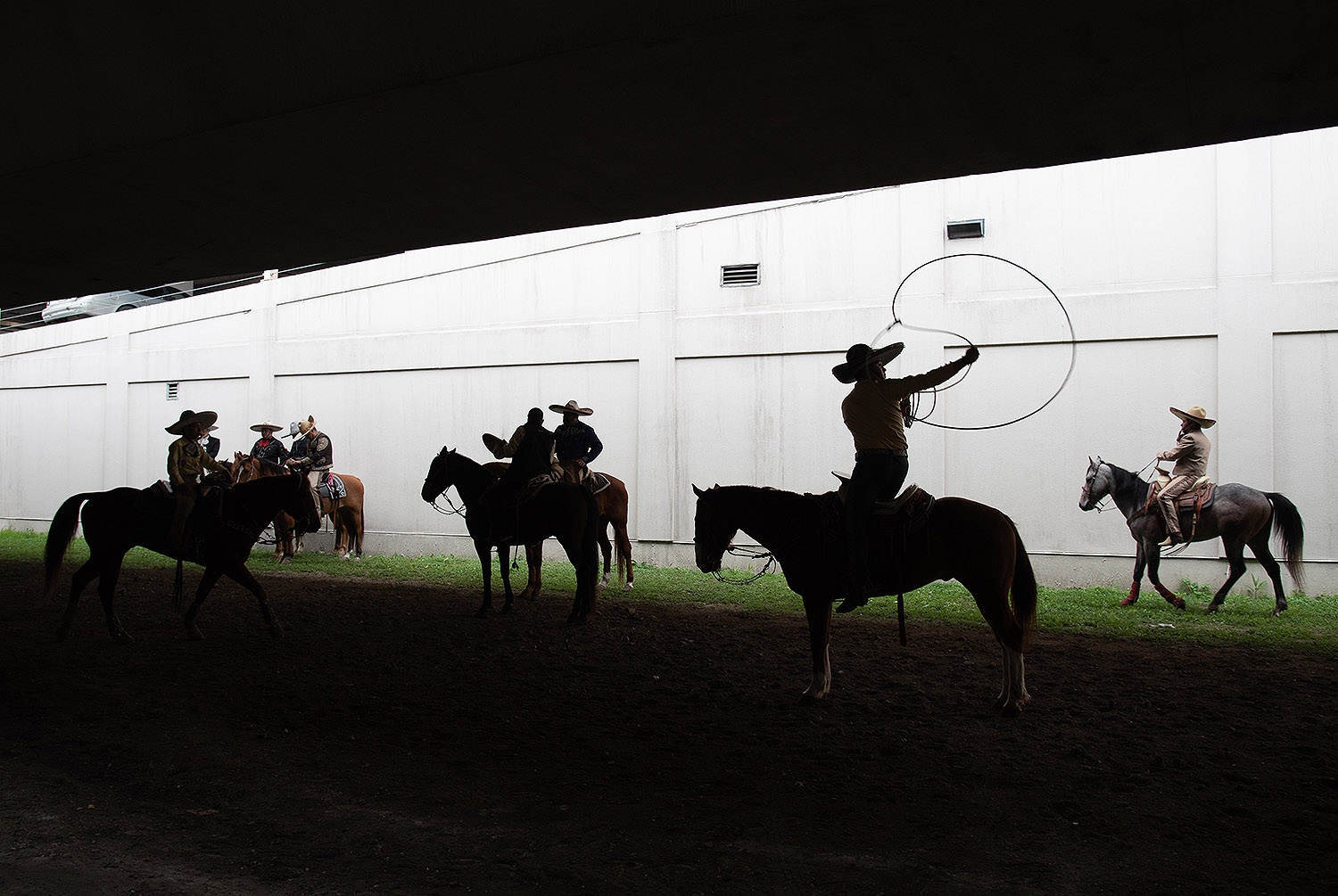Members of Charros de Bejar practice before the Western Heritage Parade and Cattle Drive Feb. 2 under I-35 at Houston St. <em><b>Photo by V. Finster | Heron</b></em>