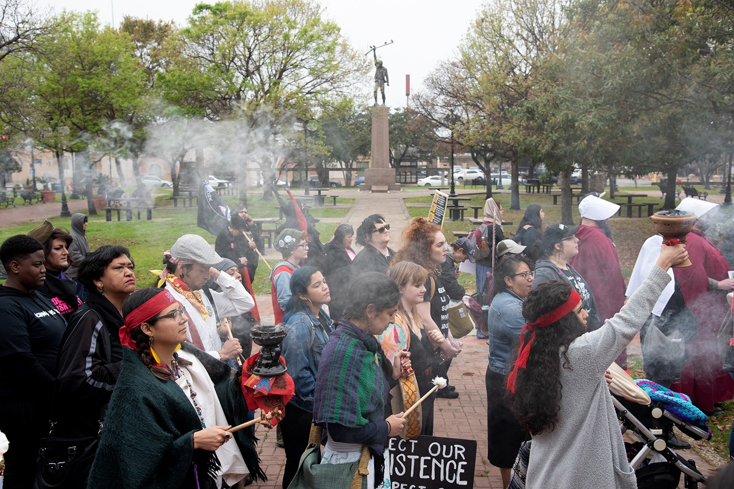 Participants during a blessing before the 29th annual San Antonio International Women’s Day March in Milam Park on Saturday, March 2. <b><em>Photo by V. Finster | Heron</em></b>