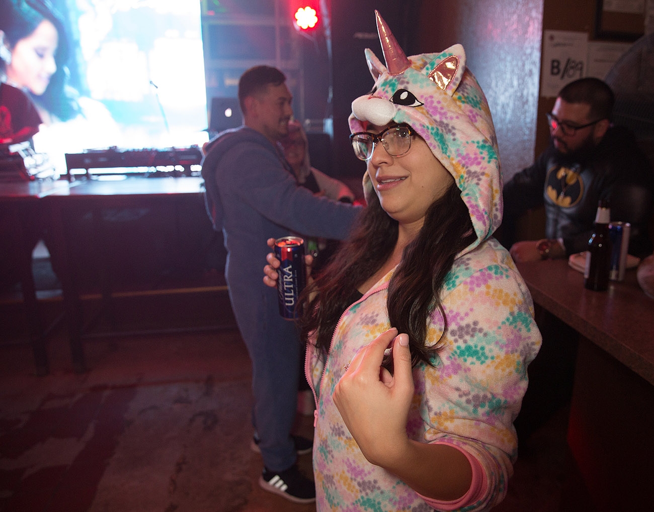 Pub runners have some drinks and bust a few moves during the onesie-themed Pub Run at Moses Rose's Hideout, Jan. 4, 2019. <em><b>Photo by B. Kay Richter | Heron contributor</b></em>