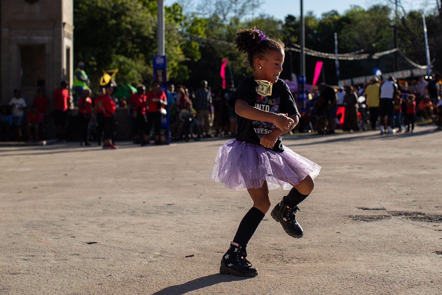 Jade Freeman dances to a jazz band performing at A Taste of New Orleans, the 35th edition of the Fiesta event, on Saturday evening, April 2, 2022, at Sunken Garden Theater in San Antonio, Texas. Photo by Kaylee Greenlee Beal | Heron contributor