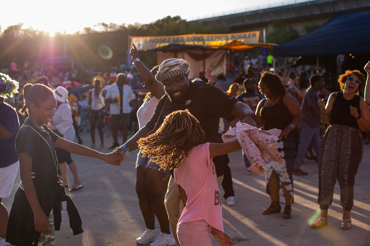 Several people danced and drank while listening to a jazz band perform during A Taste of New Orleans, the 35th edition of the Fiesta event, on Saturday evening, April 2, 2022, at Sunken Garden Theater in San Antonio, Texas. Photo by Kaylee Greenlee Beal | Heron contributor