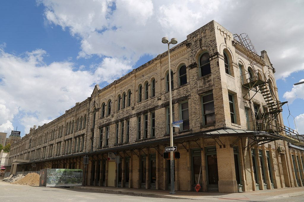 The former Continental Hotel, 322 W. Commerce St., will be sold to a developer for the production of mixed-use, mixed-income housing. Photo taken by Ben Olivo | Heron on Sept. 9, 2019